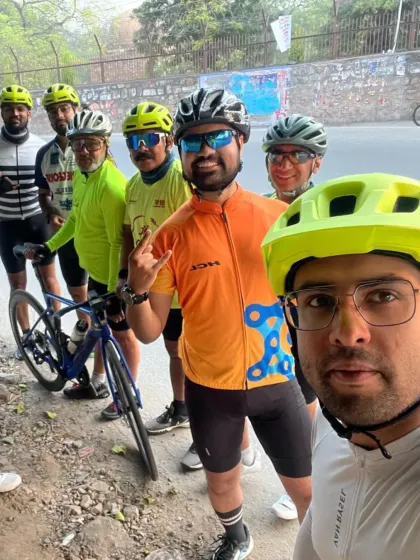 A group selfie from the Qutub Minar ride. It's not about racing, it's about showing up and riding together.