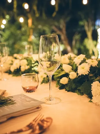 A close-up of the elegant tablescape from the intimate garden dinner.