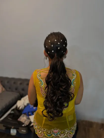 Another angle of the crystal-adorned ponytail, showing how it catches the light.