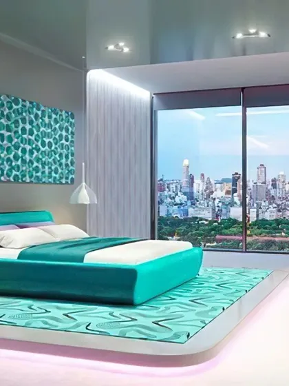 A futuristic bedroom design with a vibrant turquoise color scheme and a stunning city view. The custom bed frame and integrated platform lighting create a sleek, modern look that feels both bold and luxurious.