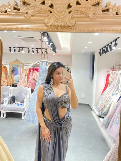 Another angle of this gorgeous grey pre-draped saree. The mirror selfie captures the sparkle of the embellished blouse perfectly.
