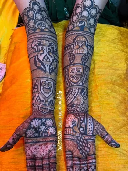 A full view of a traditional design with peacocks and lotus flowers as the main theme. The use of dark and light shading adds depth to the artwork.