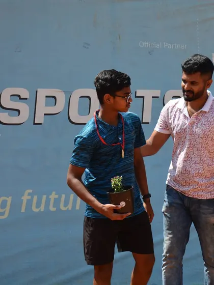 Our founder congratulating the Boys U18 runner-up. This personal touch is a hallmark of our events, showing our investment in each player's journey.