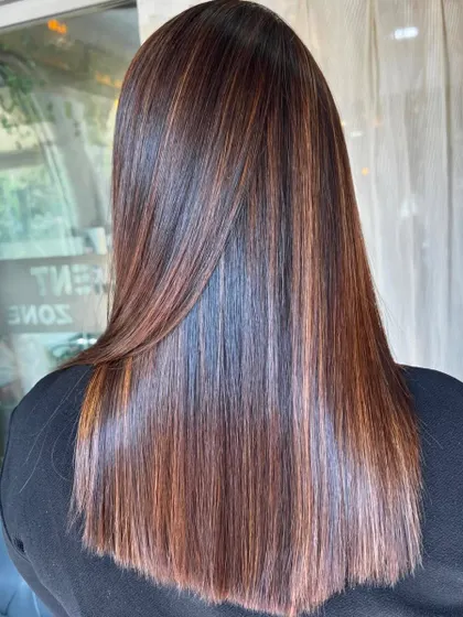 Another angle of the glossy, smooth finish achieved with our hair Botox treatment. The results speak for themselves.