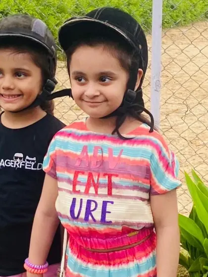A close-up of two friends excited for their riding adventure. We see so many friendships blossom here.