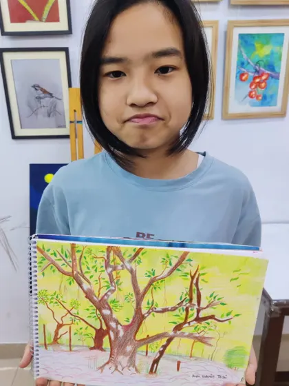 Another student showcases her interpretation of a tree study, using bright colors and expressive lines in her watercolor sketchbook.