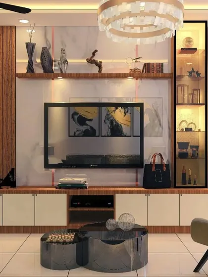 Another angle of the luxurious living room, showing the detailed TV unit with a glass display cabinet and ample storage. The combination of wood, marble, and light creates a rich and inviting atmosphere.