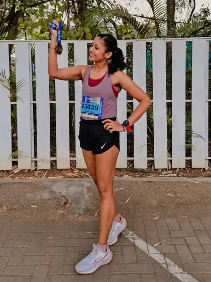 Celebrating a new personal best at the Pune City Marathon, improving my time by two minutes from the previous year. Fearless in chasing dreams.