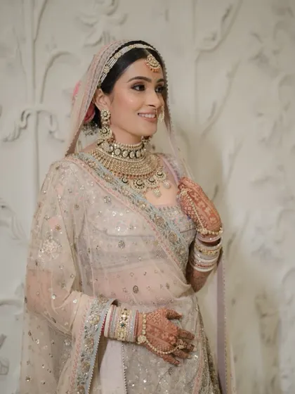 My bride Tanisha, looking like a dream in her pastel Anita Dongre lehenga. We created a soft, glowing makeup look to match the ethereal quality of her outfit.