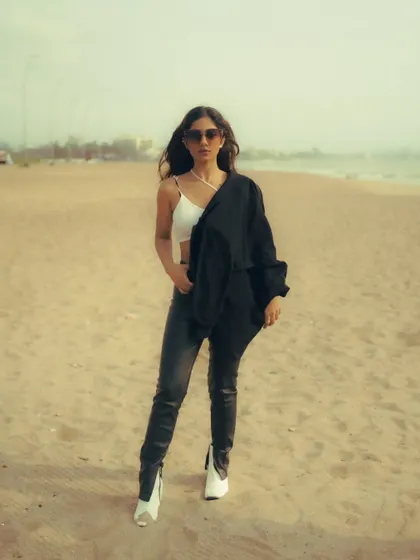 An editorial-style beach shoot with an edgy, high-fashion look. The mix of color and black and white images shows the versatility of a single location.