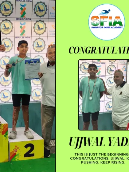 Ujjwal Yadav on the podium after winning two Silver medals in the 100m and 200m Freestyle at a swimming competition in Ambala.