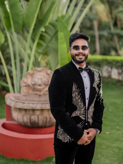 A stylish reception look. We love capturing the glamour and fun of the evening party, from the designer outfits to the happy, candid interactions.