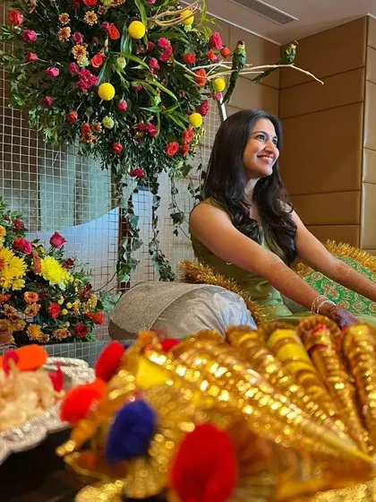 A candid shot of a beautiful bride at her mehendi ceremony. It's a joy to see my work become part of such a happy and colorful celebration.