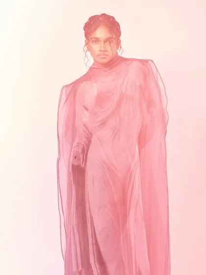 A full-length shot of the sheer pink gown for Ponny Mag, showing the complete silhouette.