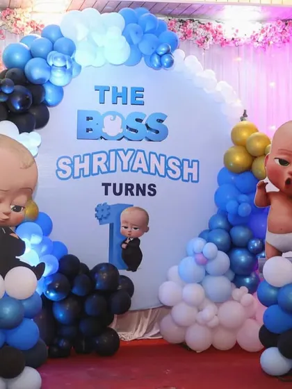 Another perspective of the Boss Baby stage, highlighting the different character poses and the full balloon arch.