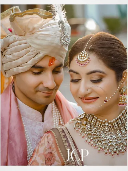 A close-up portrait of the couple on their wedding day.