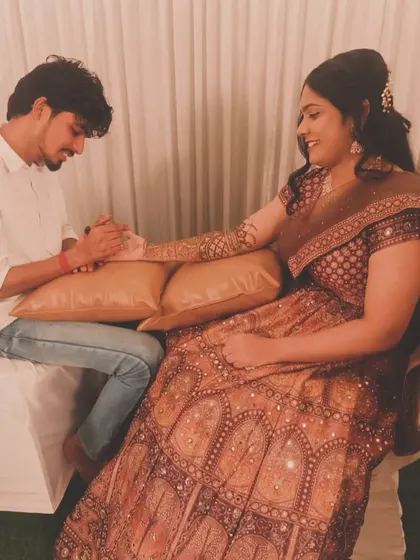 A beautiful bride in her engagement lehenga getting her mehandi done by me.
