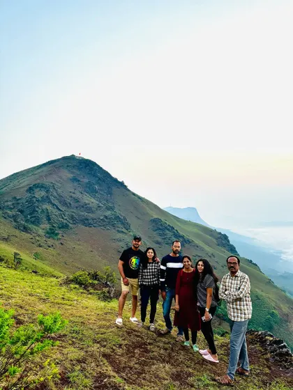 A smaller group enjoying the morning light over the Chikmagalur hills.
