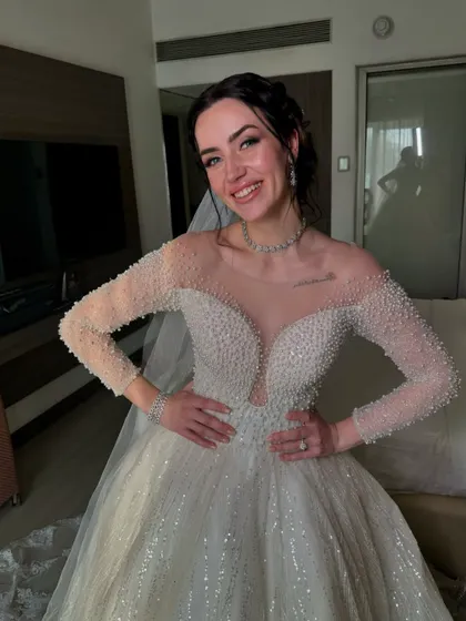 Elegance in white, glowing with love and grace. This Catholic bride looks absolutely radiant on her special day.