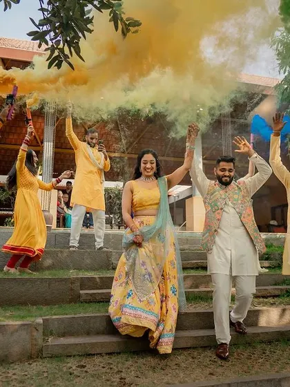 A collection of fun and vibrant moments from a sun-drenched Haldi. From playful entries to candid portraits, we capture the complete story of this joyous celebration.