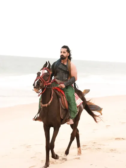 A male warrior concept shoot on the beach. Using the natural landscape and strong, directional light, I created a series of intense and heroic portraits of an actor, complete with a sword and styled costume.