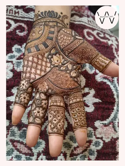 An intricate design with a mix of floral and geometric patterns.
