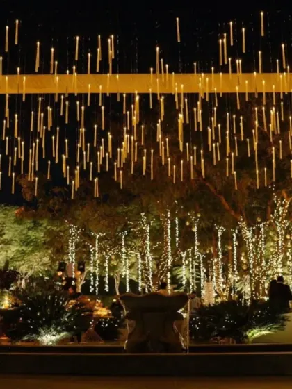 A welcome dinner where light was the main feature. Floating candles and trees wrapped in fairy lights created a dreamy, magical atmosphere for an intimate sit-down dinner under the stars.
