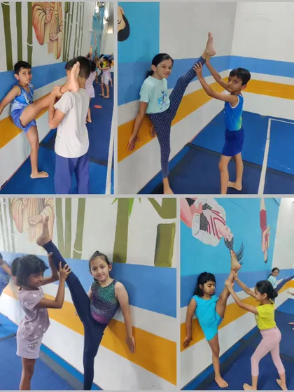 More partner stretching during our Sunday flexibility day. We create a supportive environment where students help each other reach their goals.