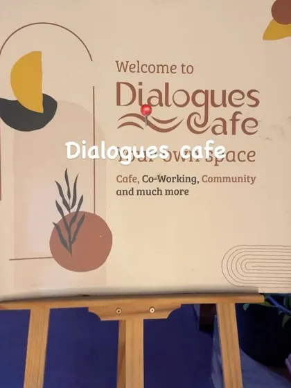 Welcome to Dialogues Cafe: a place for coffee, co-working, community, and so much more. This sign at our entrance captures the essence of what I aim to provide.