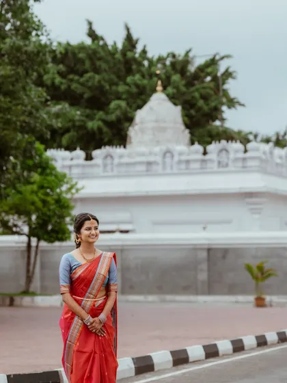 Another angle of this beautiful, natural engagement look. It shows how the makeup appears soft and elegant even from a distance, which is key for event photography.