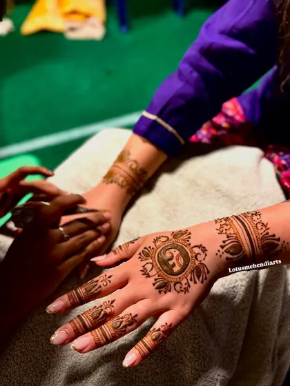 A simple yet elegant design with a central Ganesha motif, perfect for a guest who wants a touch of tradition.