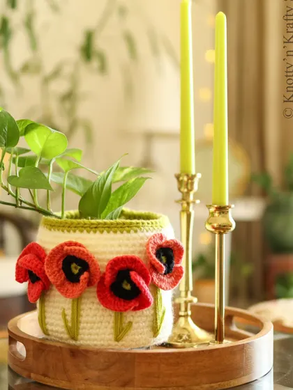 My Remembrance Poppy Basket, designed for that unexpected pop of red. The delicate crochet poppies are set against a cream-coloured basket, creating a striking and beautiful piece.