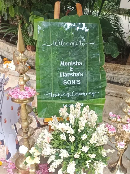 A simple welcome can make a big impact. For this naming ceremony, I created a modern acrylic welcome sign placed against a fresh banana leaf, combining contemporary design with a touch of tradition.