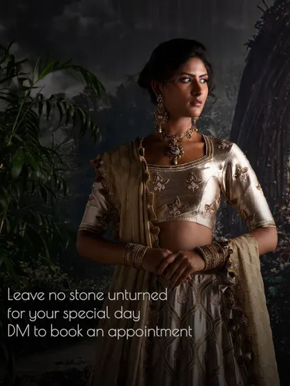 I leave no stone unturned for your special day. This image captures the regal posture of a bride in her custom-made lehenga, a result of our collaborative design journey.