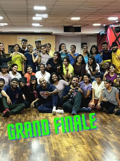 A group photo of our hardworking and dedicated dancers after a long rehearsal for the "Inspirations" grand finale. The sense of accomplishment and community is palpable.