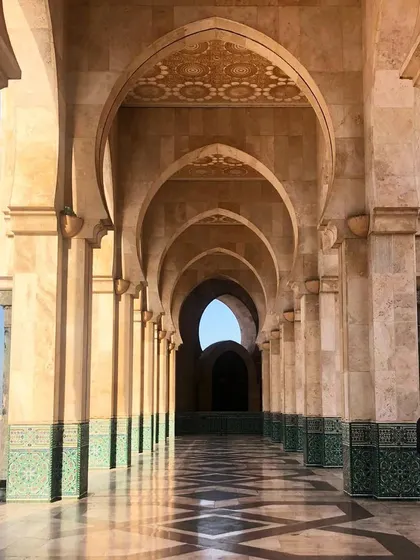The grand arches of the Hassan II Mosque in Casablanca. The scale, the geometric patterns in the tilework, and the sheer beauty of the architecture are a profound source of inspiration.