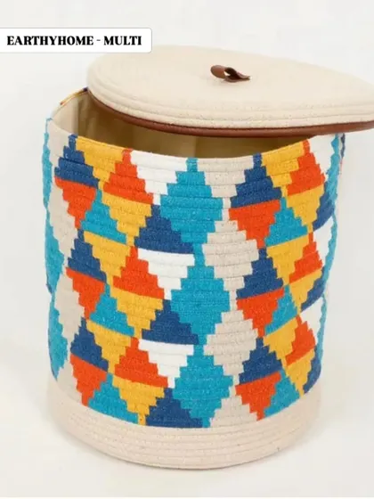 This multi-colored geometric rope basket is a vibrant storage option. It's a great way to add a pop of color to a neutral-themed room.
