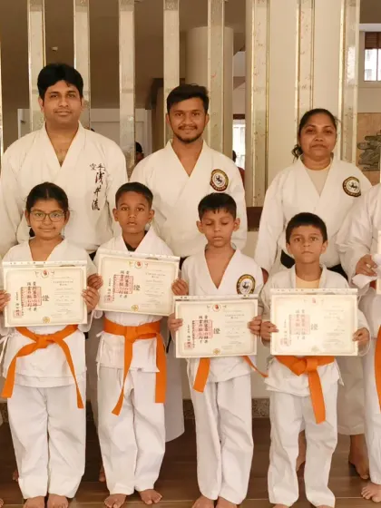 These students have just received their orange belts at the Virar branch. They are building a strong foundation in the fundamentals of Shotokan Karate.