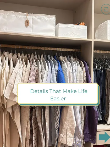 Details that make life easier. A well-organized men's wardrobe with shirts hung neatly and storage boxes for lesser-used items on the top shelf.