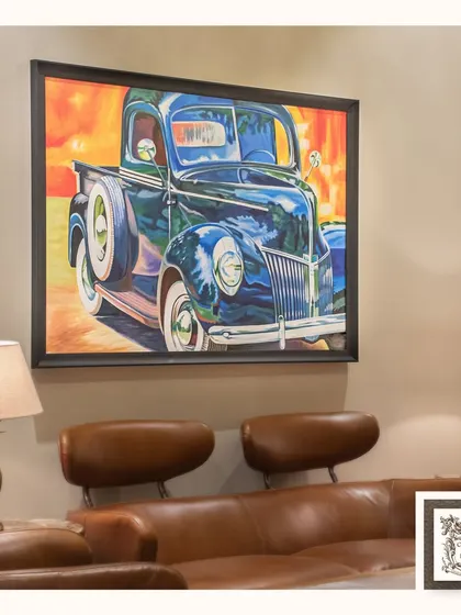This retro-inspired painting of a classic truck exudes old-world charm and nostalgia. The vibrant colors and dynamic composition make it a standout piece for any car enthusiast.
