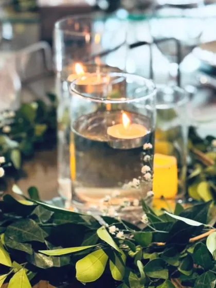 The warm glow of floating candles creates a magical and peaceful ambiance for the sacred ceremony.