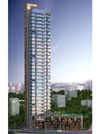 The "Oceanique" tower, a residential project designed to offer timeless elegance and modern comfort. This render showcases the full building, emphasizing its sleek profile against the city skyline.