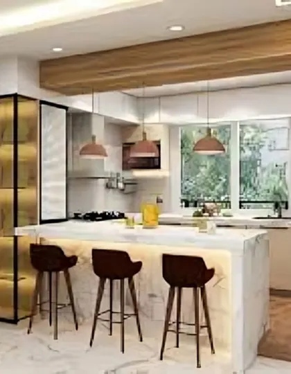 This bright, open kitchen features a marble-clad island with seating. The design is complemented by a tall, glass-fronted cabinet for a touch of elegance.