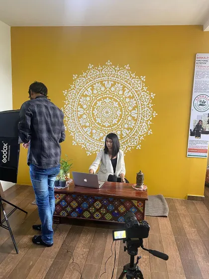 Co-founder Natasha Jha preparing to share her expertise on camera. We believe in educating and empowering our clients every step of the way.