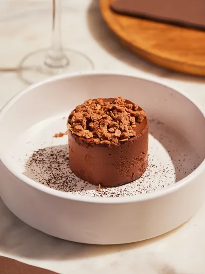 The elegant simplicity of our Bitter Choco Mousse, a dessert that speaks for itself.