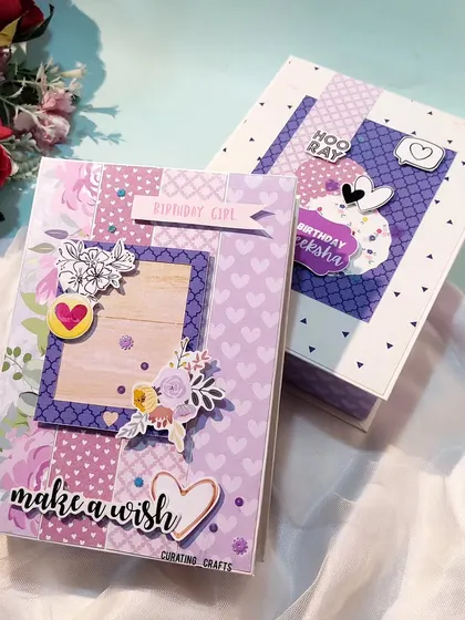 Two A5 scrapbooks shown together, each with its own unique personality and theme. I can create coordinating or contrasting designs for different recipients.