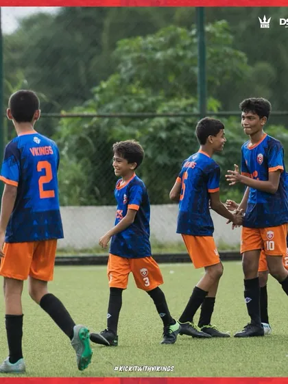 Another win in the books. The team celebrating a goal together, showcasing their great chemistry.