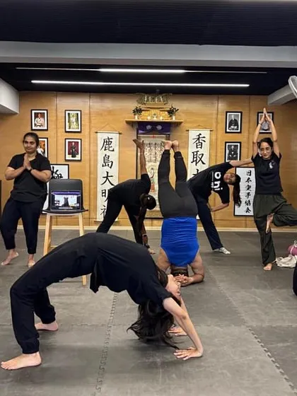A key part of martial arts is building a strong, flexible body. Our sessions include conditioning and stretching to improve your mobility and prevent injury. Here, our students work on flexibility, which is essential for both defense and overall health.