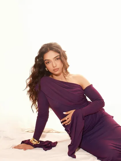 Another powerful pose from the Elle India shoot, showcasing the draping and form of the purple gown.