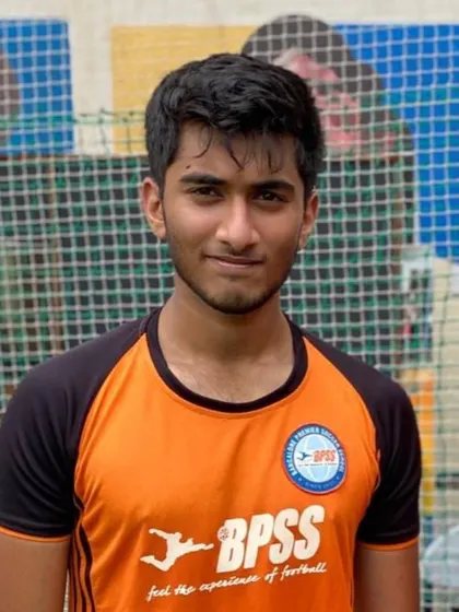 A close-up portrait of our striker Anirudh. His focus and determination are clear to see.